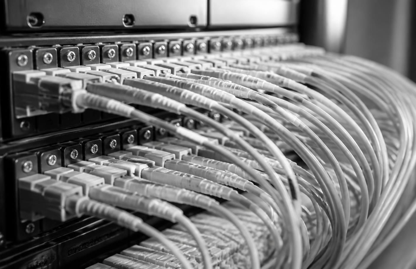 Network patch panel with ordered fibre optic cabling in close view